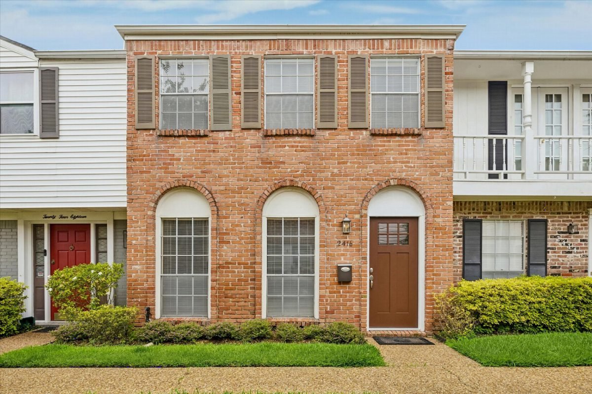 Arched Brick and White Trim