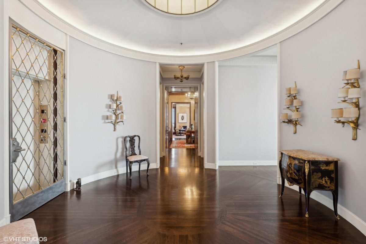 Curved Gallery with Brass Accents