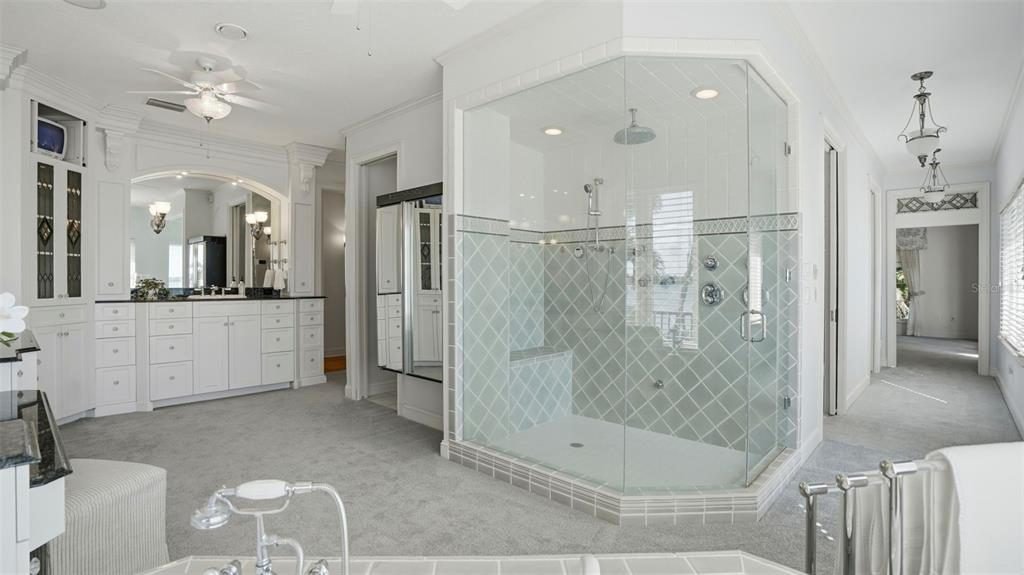 Glass-Enclosed Coastal Shower Retreat