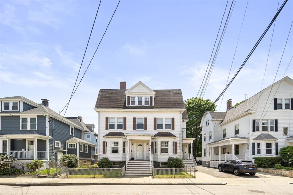 White Shuttered Colonial Elegance