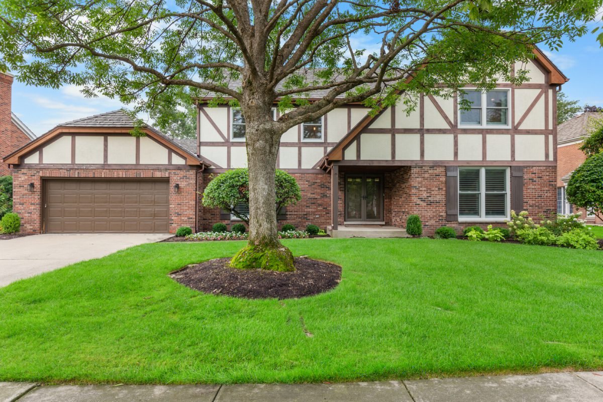 Tudor Brick and White Paneling