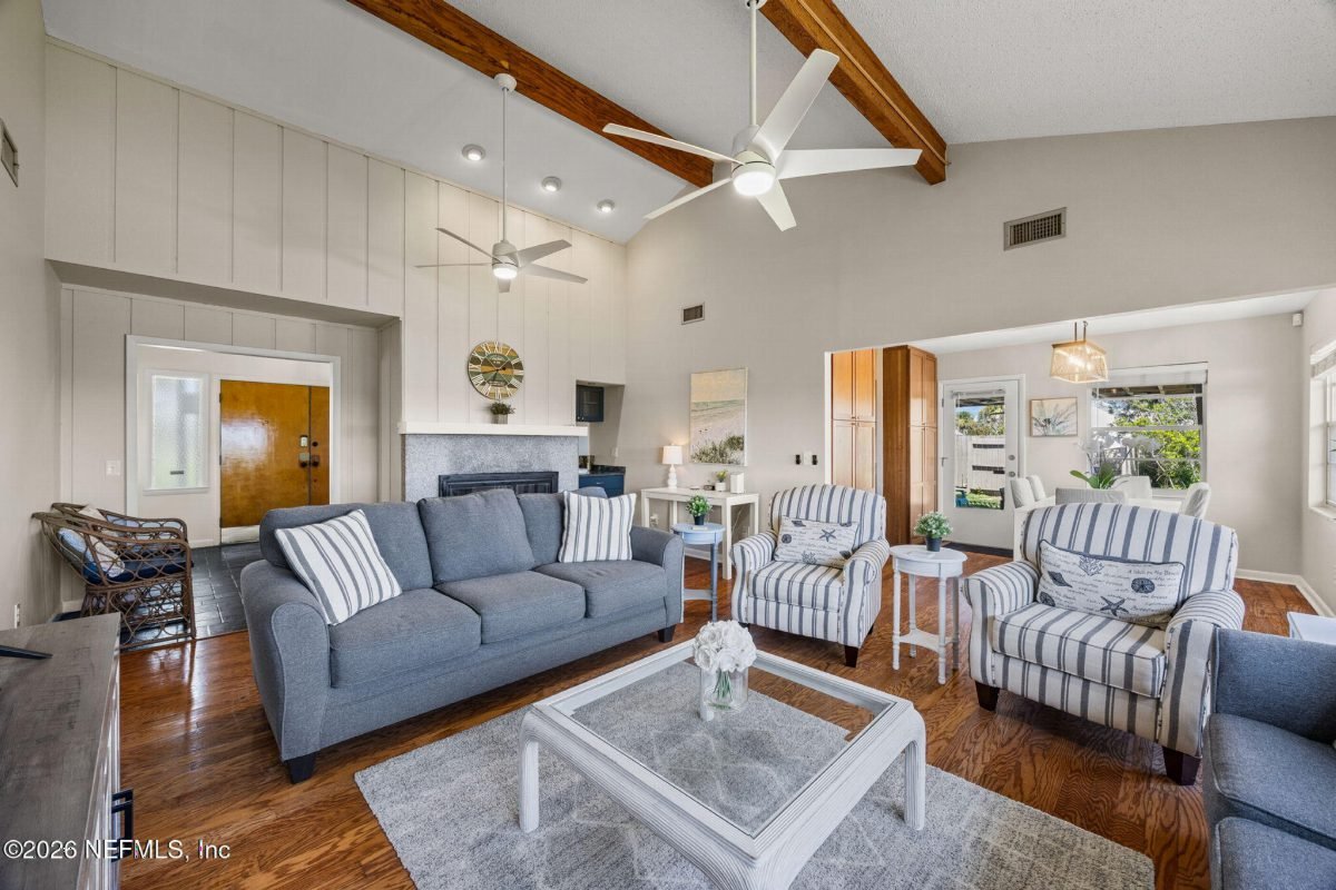 Gray Sofas Under Cedar Beams