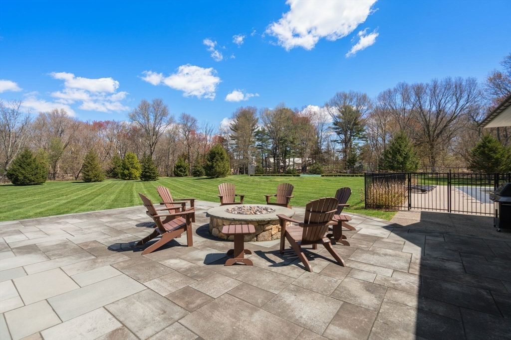 Stone Patio and Wood Adirondacks