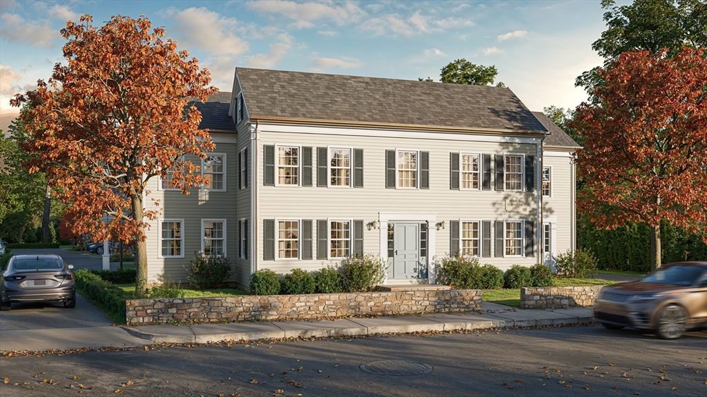 Silver Siding with Fieldstone Charm