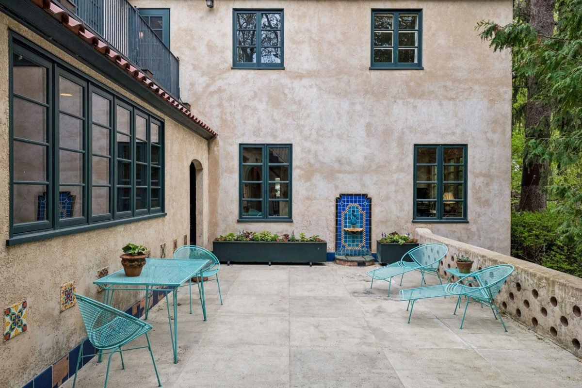 Turquoise Metal and Stucco Courtyard