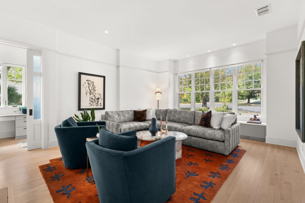 Teal Chairs and Rust Rugs