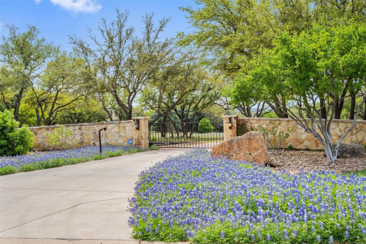Bluebonnet Driveway with Stone Walls