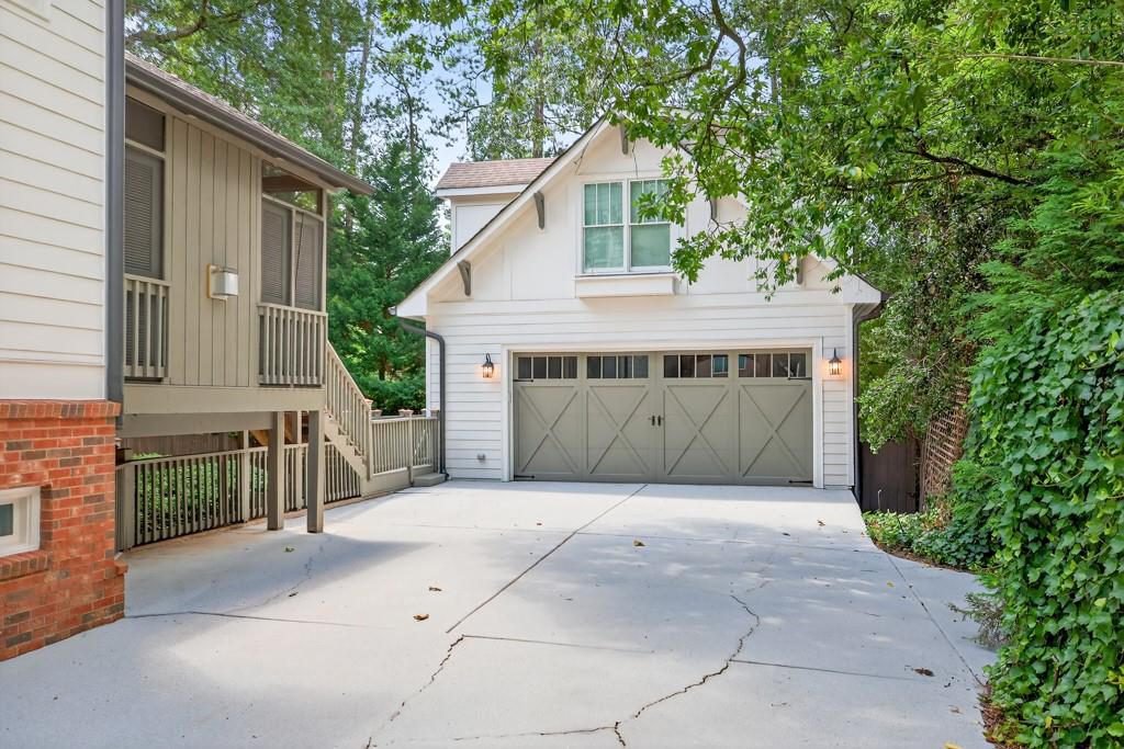 Weathered Gray Garage and White Siding