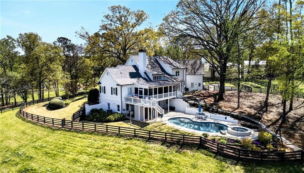 White Cottage with Poolside Charm