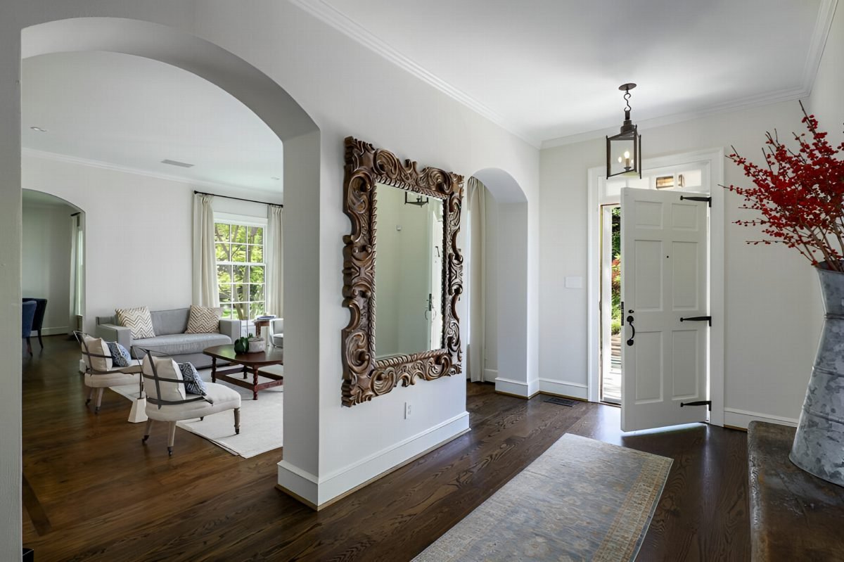 Carved Mirror and White Arches