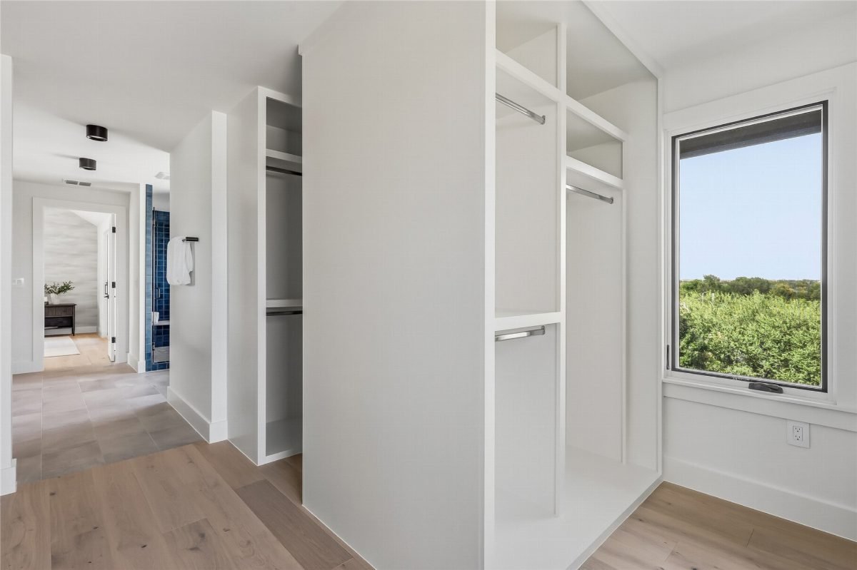 Crisp White Closets and Light Wood