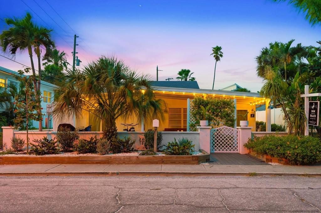 Pastel Porch with Palm Silhouettes
