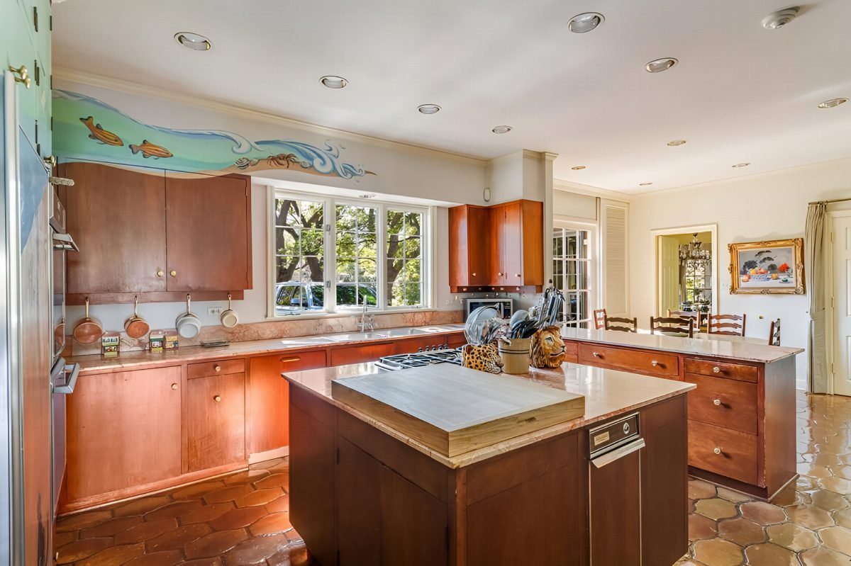 Copper Cabinetry and Terracotta Tiles