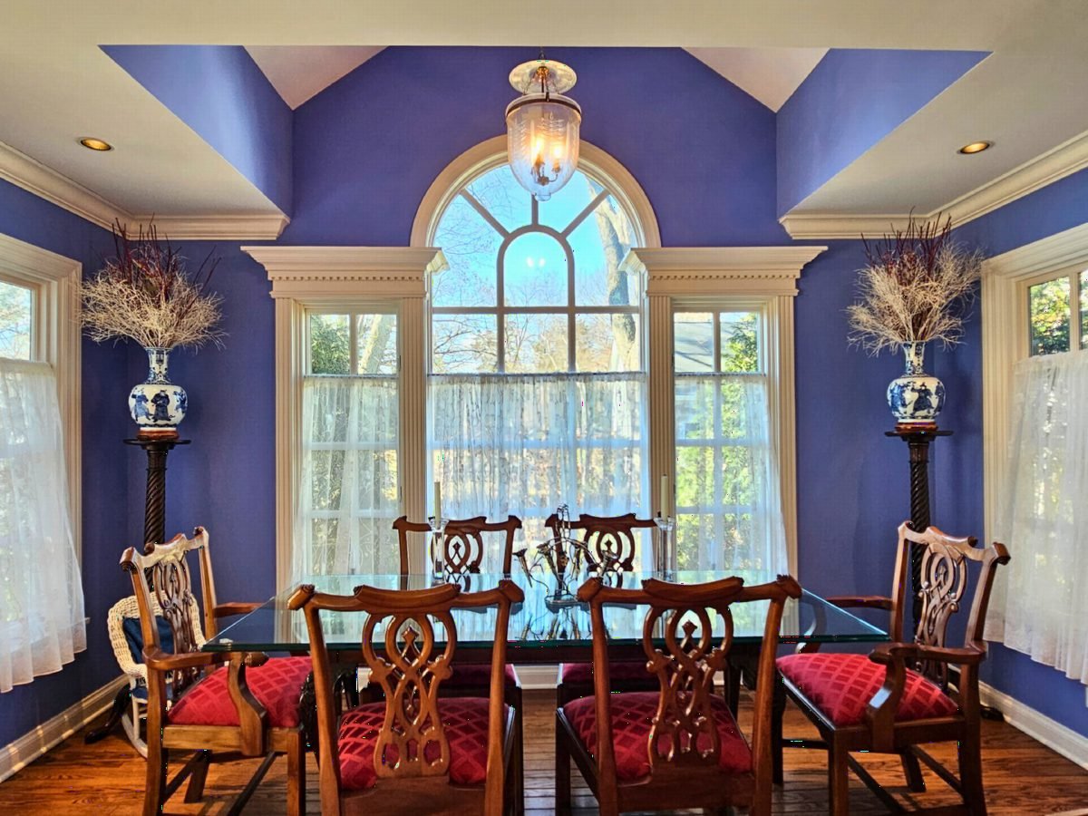 Periwinkle Walls and Red Chairs