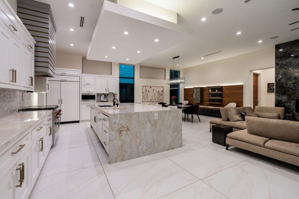 Polished Marble and White Cabinetry
