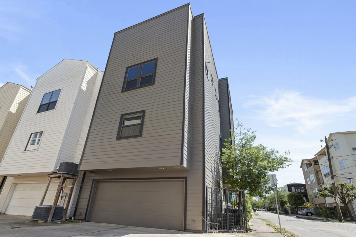 Sculpted Beige Facade with Dark Trim