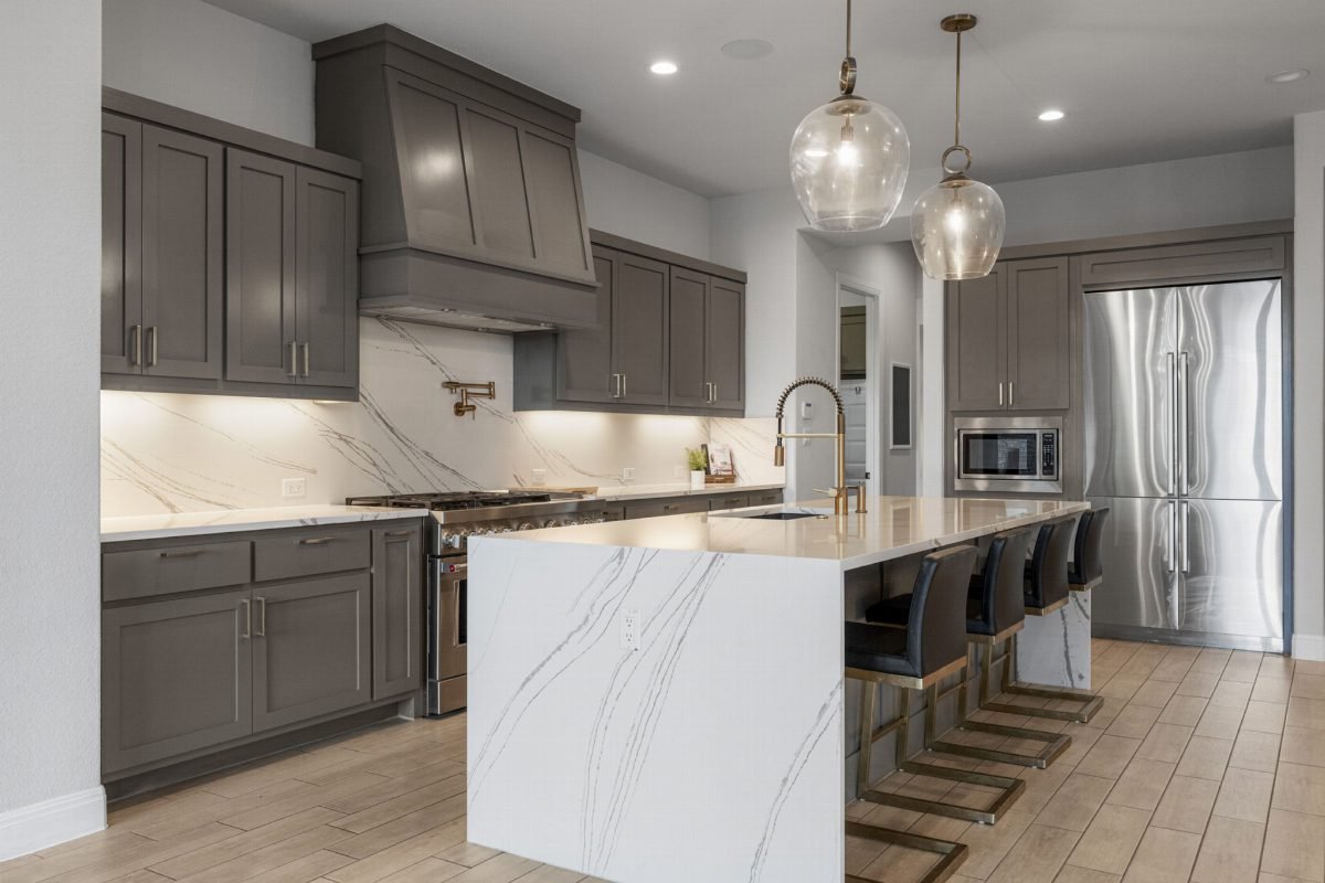 Greige Cabinetry with Marble Glow