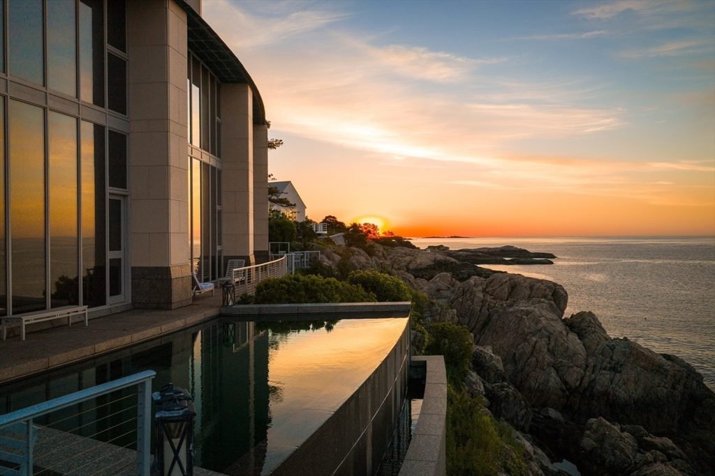 Sunset Reflections and Rugged Shores