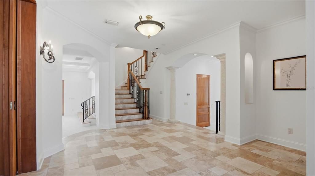 Travertine Foyer and Warm Wood