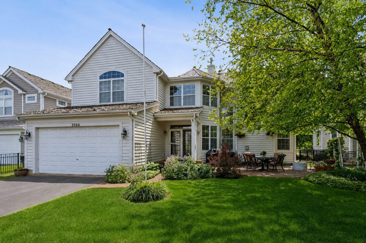 Soft Gray Shingle and White Garage