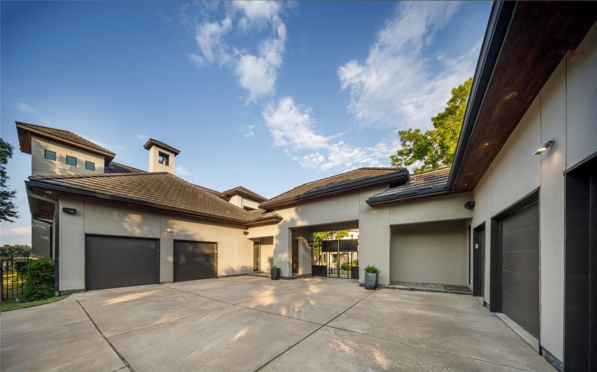 Warm Stucco and Dark Garage Doors