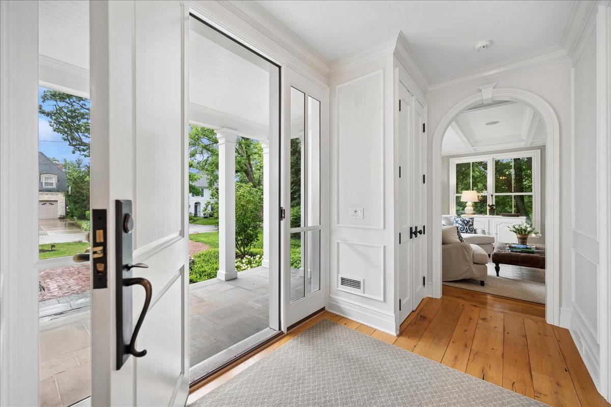 White Entry with Warm Wood