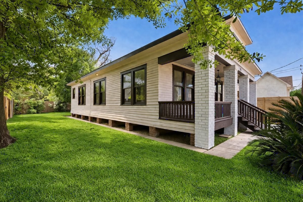 Crisp White Brick and Cream Siding