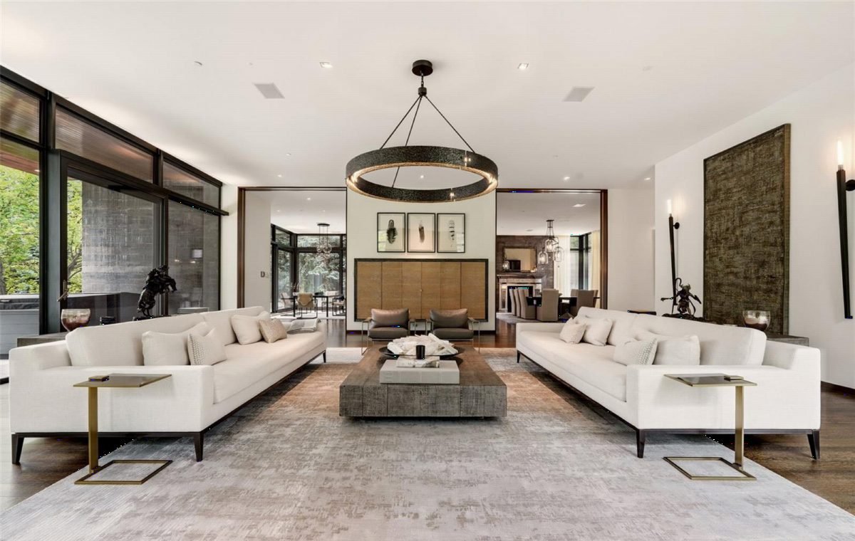 Ivory Sofas and Brass Ring