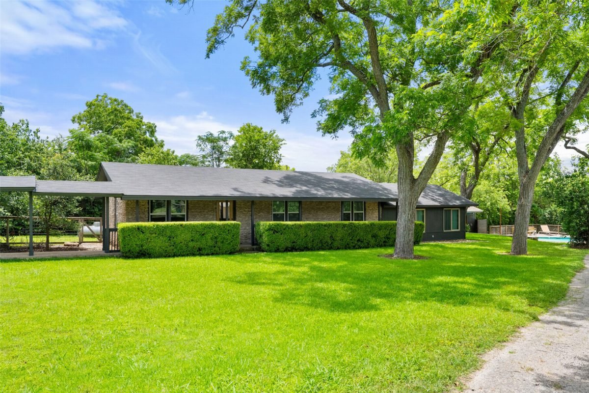 Limestone Facade Meets Lush Lawn