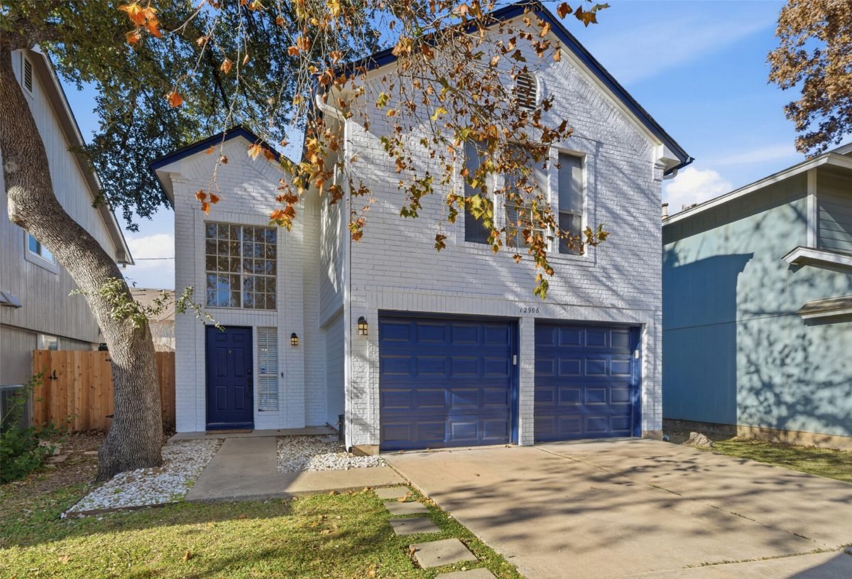 Pale Brick with Navy Doors