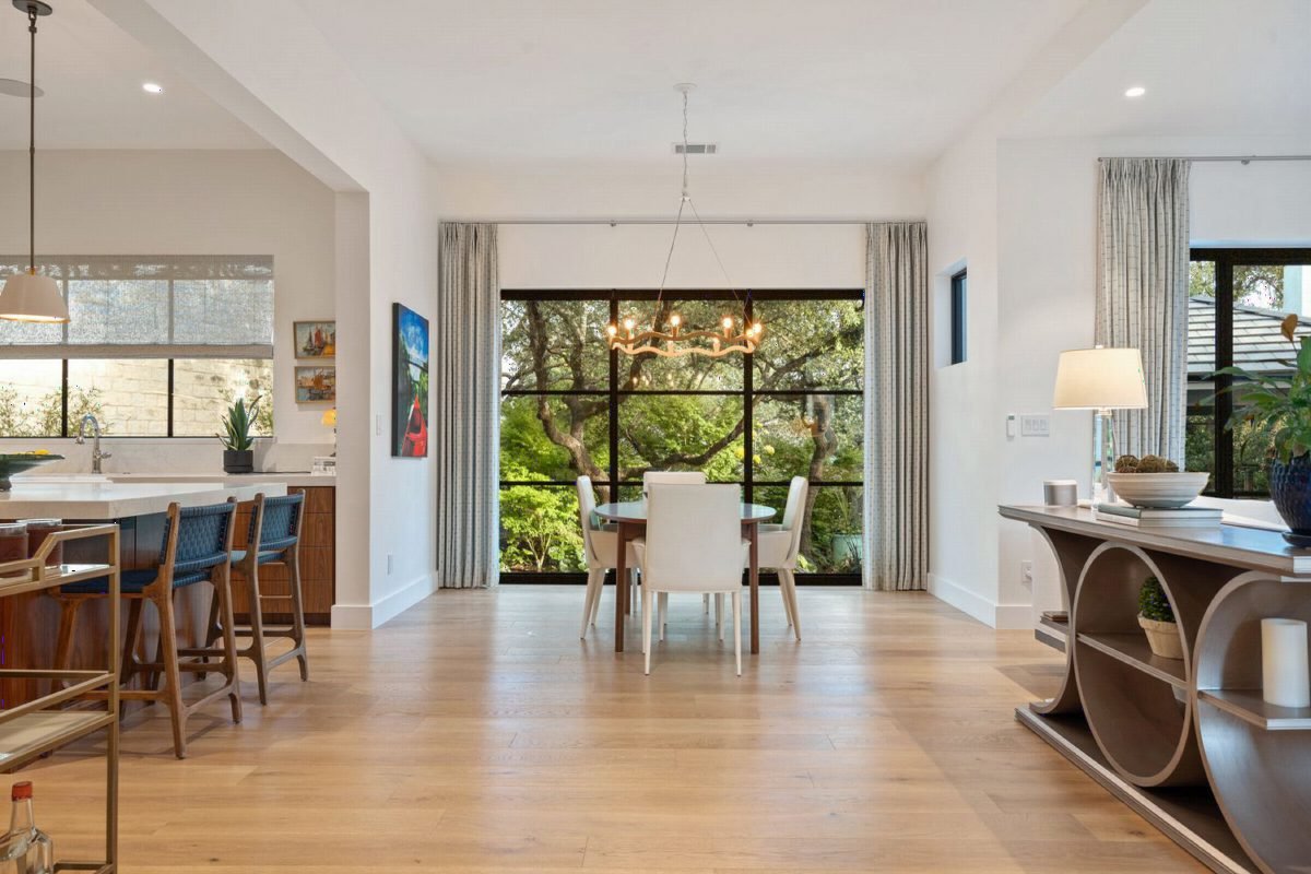 Glass-Walled Dining with Wood Warmth