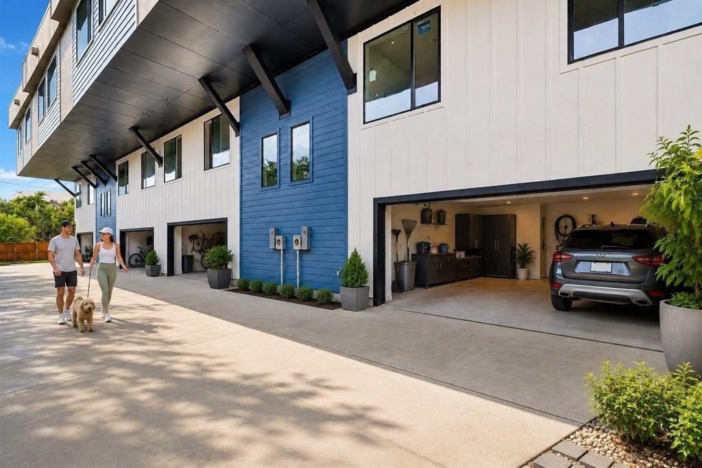 Blue Siding and Concrete Driveway