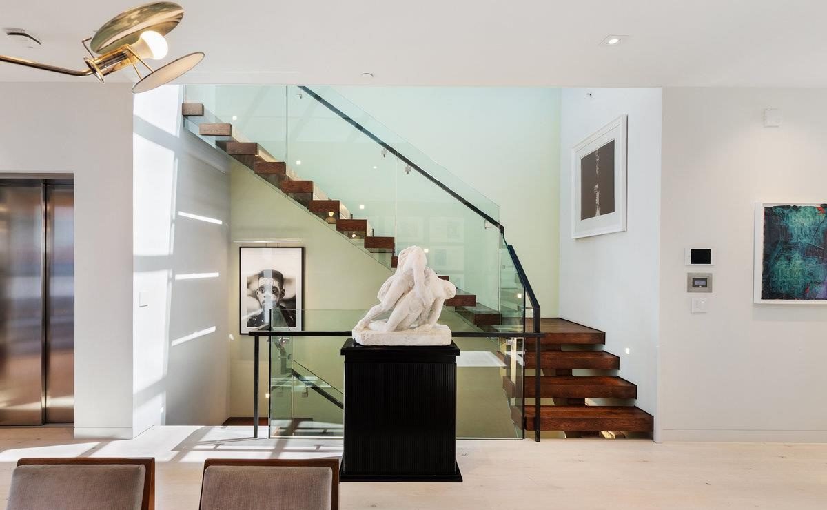 Glass Railings and Walnut Treads