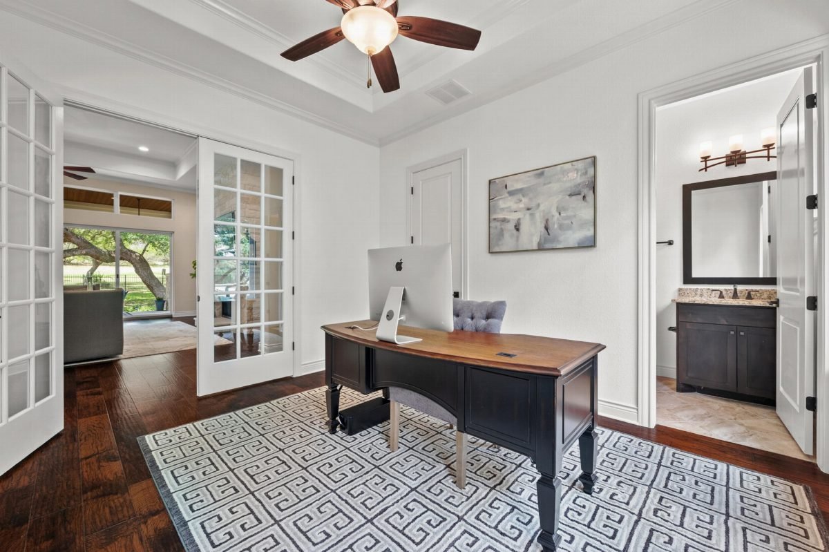 Dark Desk and Patterned Rug