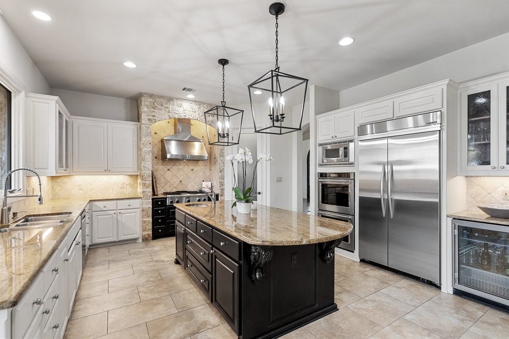 Warm Granite and Dark Cabinetry