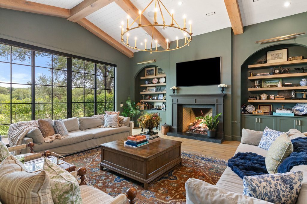 Sage Walls and Brass Chandelier