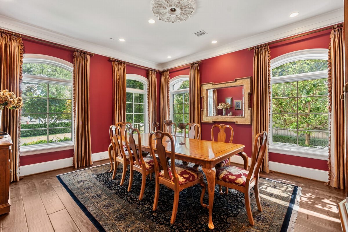 Crimson Walls and Curved Windows