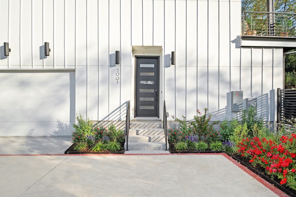 Charcoal Entry with Vibrant Blooms