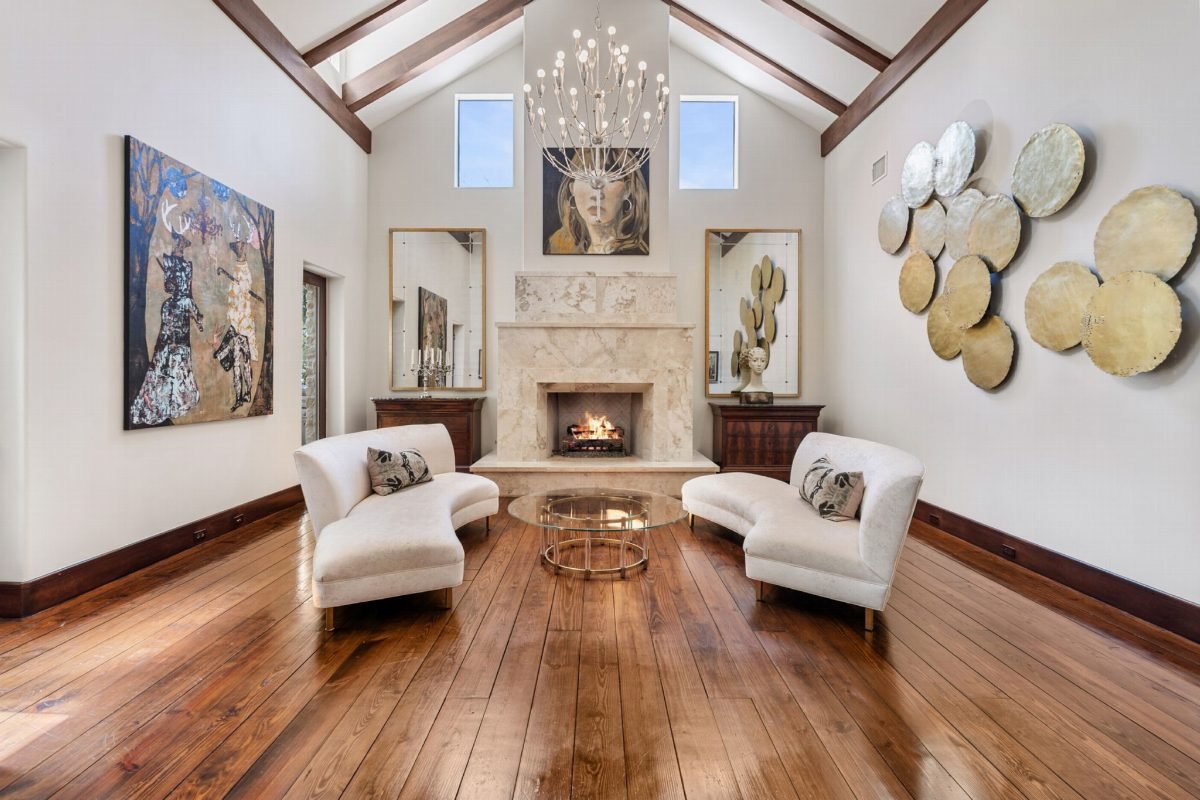 White Sofas Under Exposed Beams